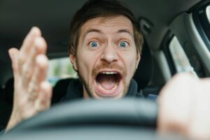 angry man in car weak emotional intelligence